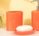 Bicchier eporta spazzolino da denti in ceramica forma ovale design e tendenza arredo bagno colore arancione