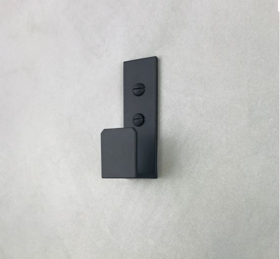 Wall hanger to hang bathrobes and bathrooms - industrial design and minimal color trend black mat