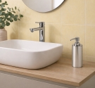 dispenser soap holder in chromed brass - round - shaped- supporting as a complement to the bathroom